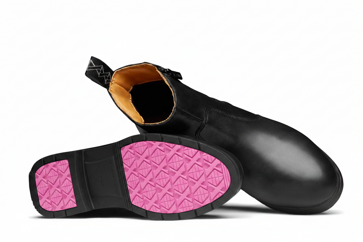 Xena Omega women’s work boots showing pink-accent outsole tread